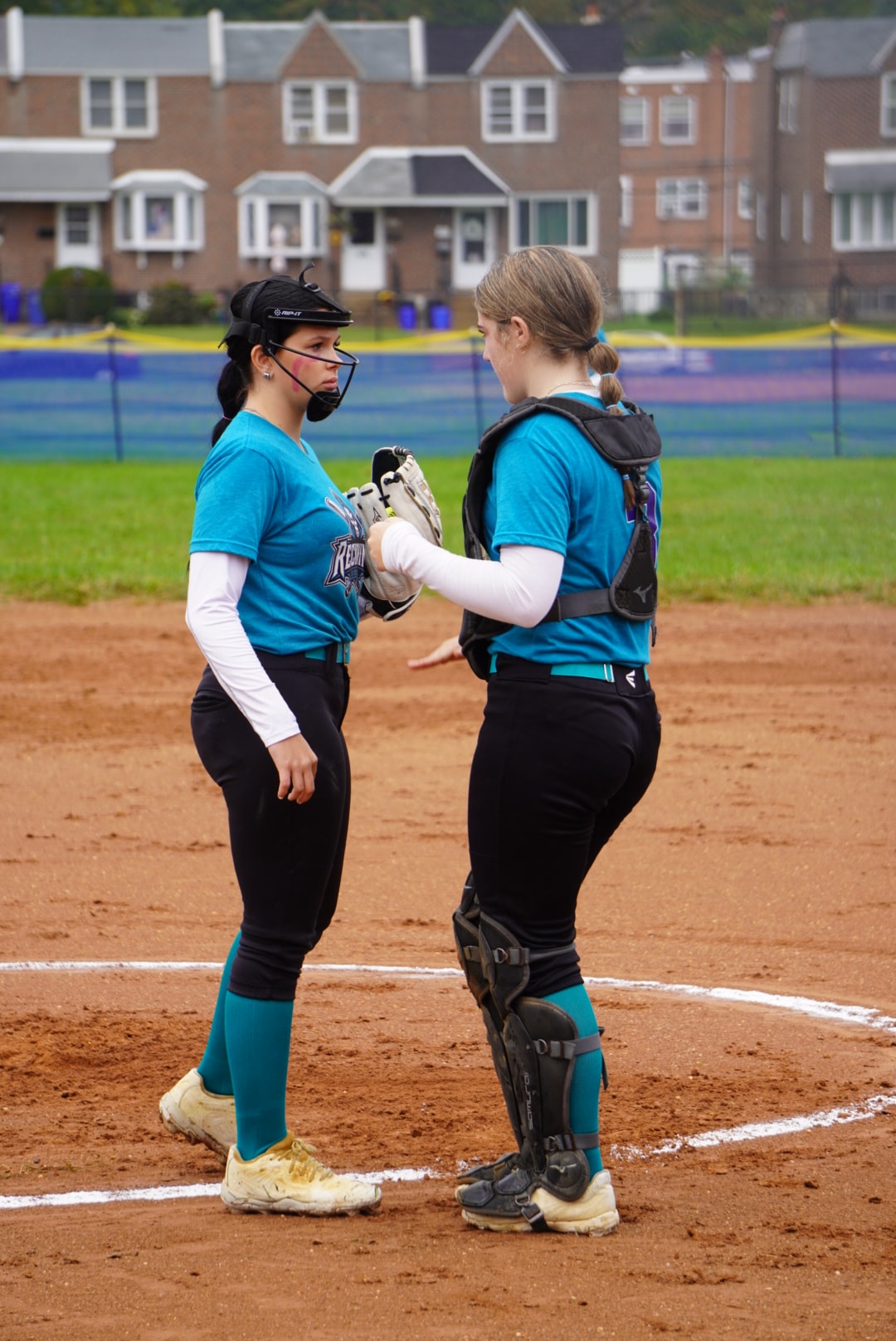 Reckoning Softball athletes together on the field