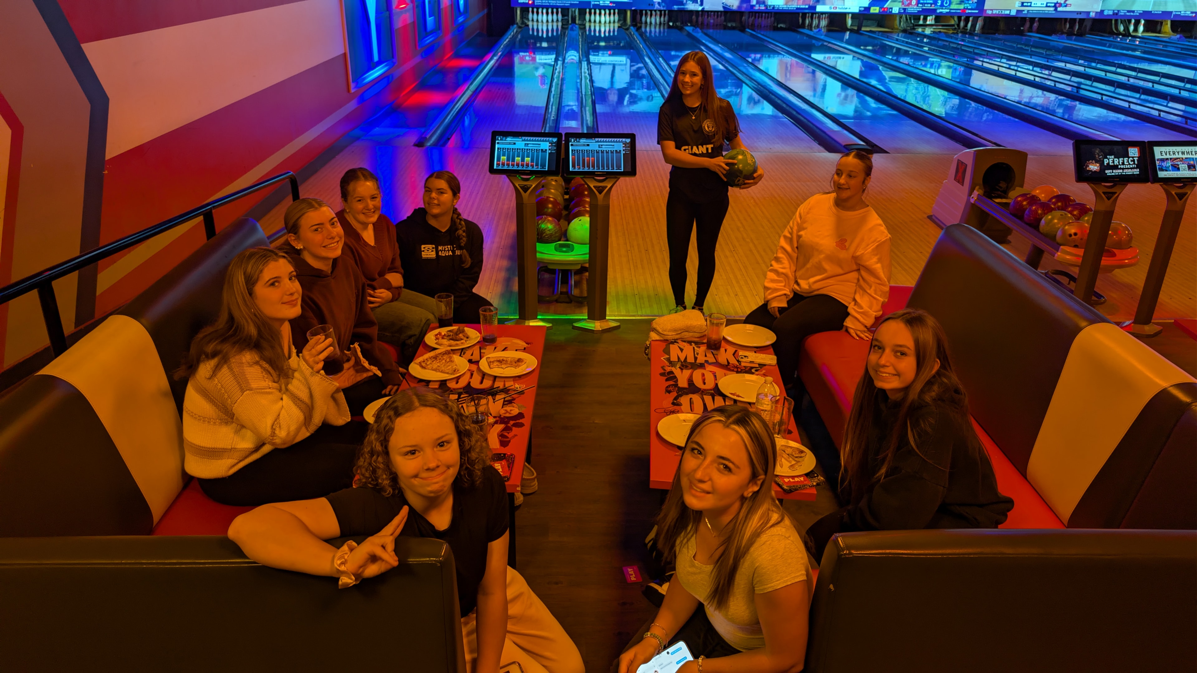 Reckoning Softball players enjoying a team bonding bowling outing